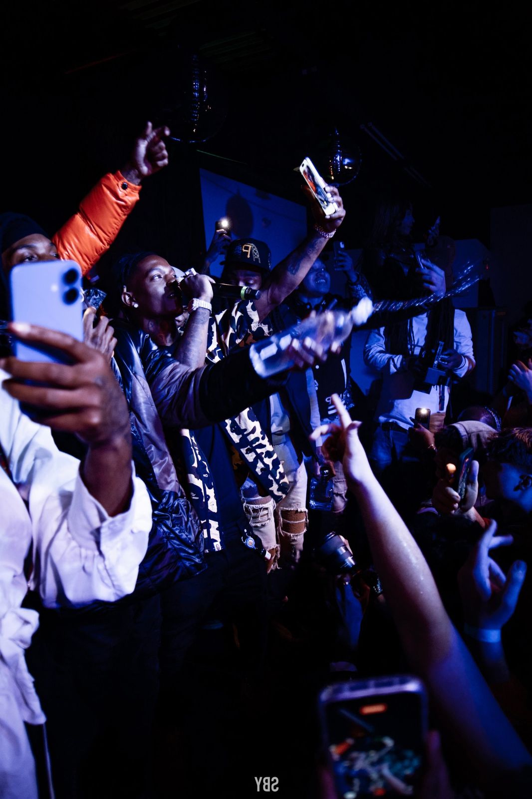 Headliner performing with the crowd recording